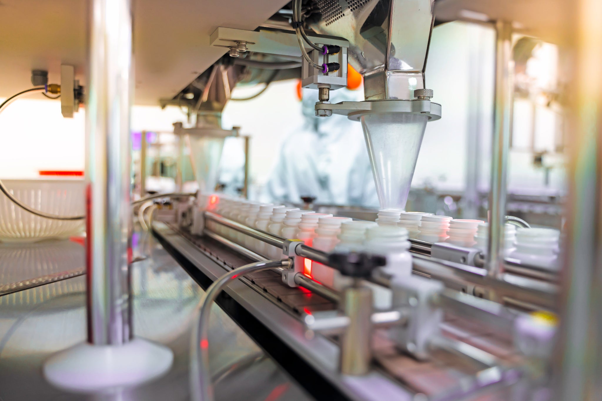 Close-up of a machine with metallic components and blurred background