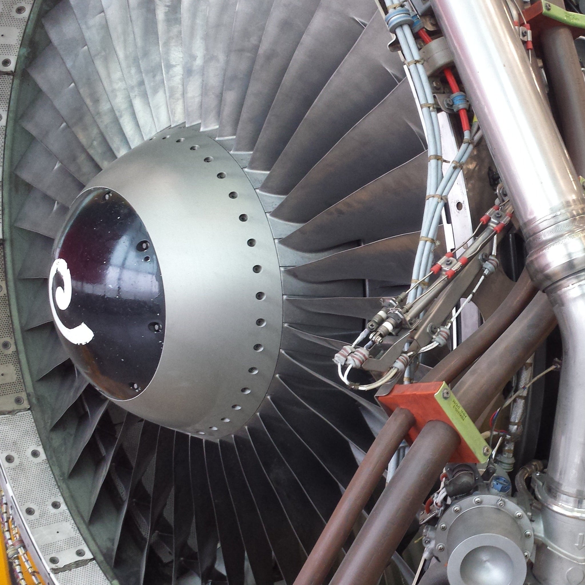 Close-up of a large industrial engine with metallic components
